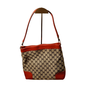 Gucci Shoulder Bag with Red Lining & Iconic Design